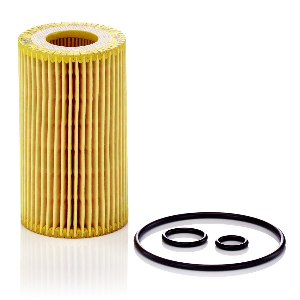 Kraftstofffilter in gelb mit drei Dichtungsringen in schwarz daneben.